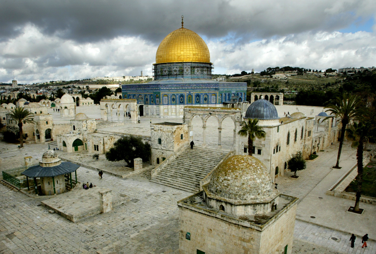 The Dome of the Rock compound, known to the Muslims as Haram as-Sharif and to the Jews as Temple Mount, in Jerusalem's Old City, is seen on the first day of the Muslim holiday of Eid al-Adha , Sunday Feb. 1, 2004. The four-day holiday, also known as the Feast of the Sacrifice, is one of the most important feasts on the Muslim calendar and nearly all work comes to a halt for the celebration. (KEYSTONE/AP Photo/Oded Balilty)
